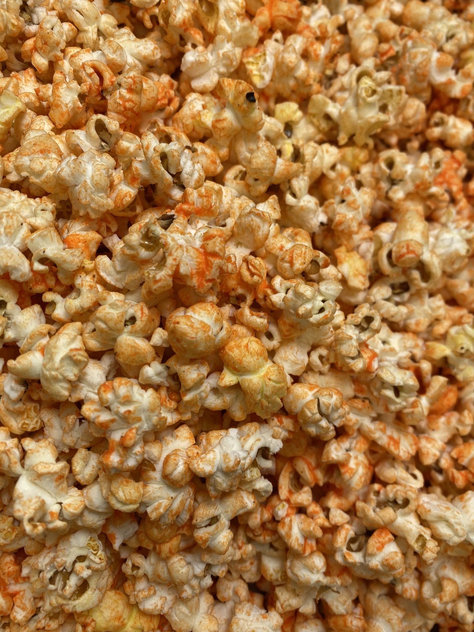 Cheddar Popcorn Close up of savory cheddar popcorn